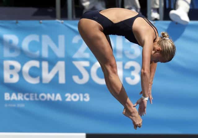 Luliia Prokopchuk from Russia performs during the women's 10-meter platform preliminary at the FINA Swimming World Championships in Barcelona, Spain, Wednesday, July 24, 2013. (Photo by Michael Sohn/AP Photo)