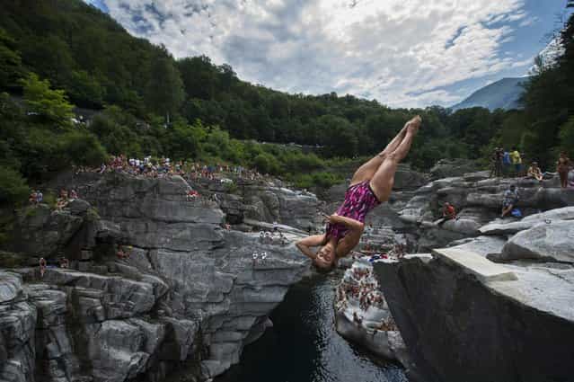 Germany's Anna Bader in action during the Cliff Diving European championships, 20 July 2013, in Ponte Brella, Switzerland. (Photo by Gabriele Putzu/EPA)