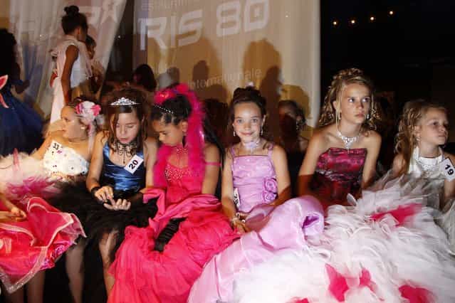 Contestants wait for the announcement of the results during the [mini-miss] beauty contest in Bobigny, Paris suburb, September 22, 2012. The competition is open for girls aged 7 to 12. (Photo by Benoit Tessier/Reuters)