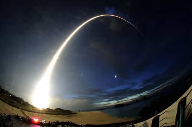 A H-2B rocket carrying cargo for the International Space Station blasts off from the launching pad at Tanegashima Space Center on the Japanese southwestern island of Tanegashima, on August 4, 2013. (Photo by Kyodo/Reuters)