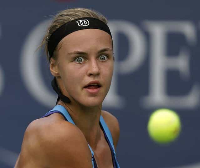 Anna Schmiedlova, of Slovakia, returns a shot against Kaia Kanepi, of Estonia, during the second round of the 2013 U.S. Open tennis tournament, Thursday, August 29, 2013, in New York. (Photo by Darron Cummings/AP Photo)