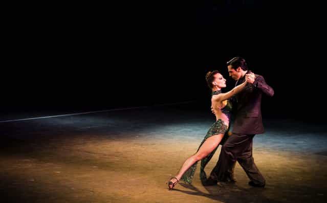 Debora Agudo and her dance partner Martin Barbadori perform during the 2013 Tango World Championship stage category in Buenos Aires, Argentina, on August 21, 2013. (Photo by Victor R. Caivano/Associated Press)