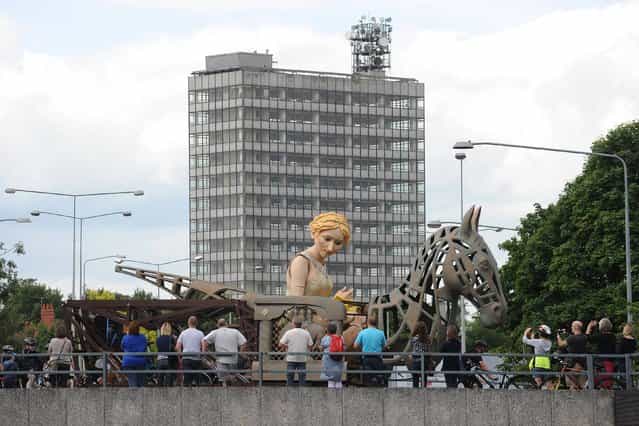 A 20ft puppet of Lady Godiva, which was taken to the London 2012 Olympics to represent the West Midlands in arts and culture makes it's return to Coventry as it travels around the city ring road, on August 10, 2013. (Photo by Joe Giddens/PA Wire)