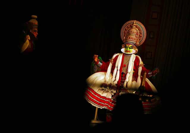 Indian Kathakali artists perform in Chennai, India, on September 4, 2013. Kathakali is a classical dance that was created in the ancient kingdoms that now make up Kerala, a state on India's southwestern coast some 400 years ago. (Photo by Arun Sankar K/Associated Press)