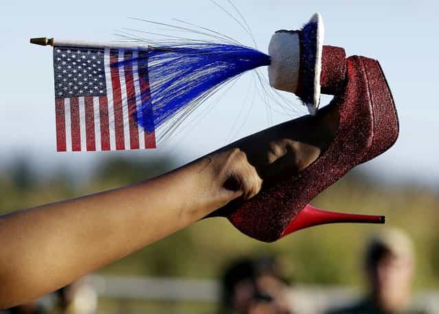Miss District of Columbia Bindhu Pamarthi displays her shoe during the Miss America Shoe Parade. (Photo by Julio Cortez/Associated Press)