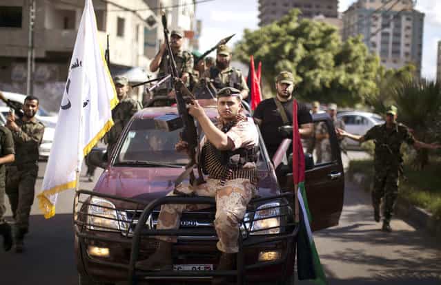 Armed Palestinian Hamas security forces patrol the streets of Gaza City on September 25, 2013. Egypt's Foreign Minister Nabil Fahmy has warned Hamas of a [harsh response] if the Palestinian Islamist movement that rules the neighbouring Gaza Strip threatened Egypt's national security. (Photo by Mahmud Hams/AFP Photo)