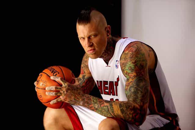Chris [Birdman] Andersen poses for Getty Images photographer Mike Ehrmann during the Miami Heat's Media Day at AmericanAirlines Arena, on September 30, 2013. (Photo by Gary Coronado/The Palm Beach Post)