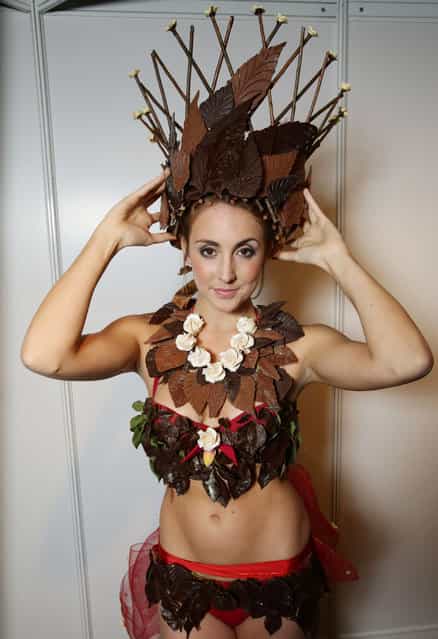 Model Giorgia Lee wearing a chocolate bikini, created by swimwear brand Bikini Fling in collaboration with Fruitful Blooms chocolatiers, during rehearsals for Salon du Chocolat's Chocolate Fashion Show – which runs from 18-20 October, and where top chocolatiers collaborate with fashion brands to create couture outfits made from and inspired by chocolate – at Olympia in west London.(Photo by Yui Mok/PA Wire)