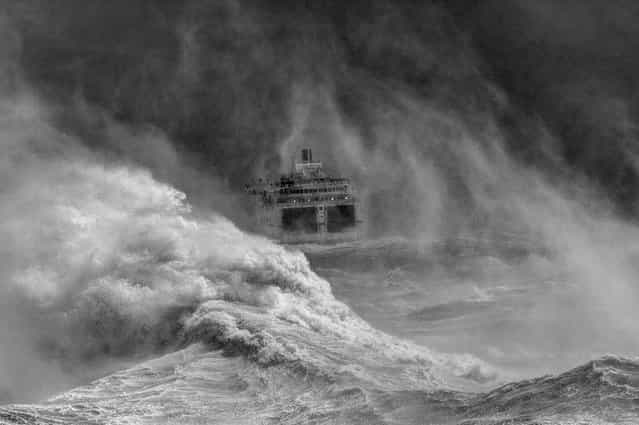 Undated handout photo issued by the Take a View – Landscape Photographer of the Year Awards of Ferry leaving Newhaven harbour in storm, East Sussex by David Lyon winner of the Your View category in the Take a View – Landscape Photographer of the Year Awards. (Photo by Dave Lyon/PA Wire/Take a View Landscape Photographer Of The Year Awards)