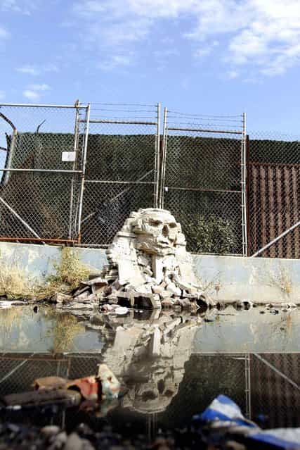 A 1/36 scale replica of the great Sphinx of Giza made from smashed cinder blocks, created by Banksy, stands in Queens on October 22, 2013. (Photo by John Angelillo/Newscom/SIPA Press)