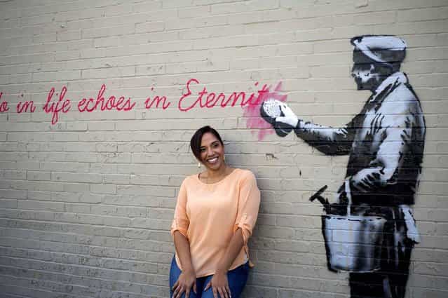 A Banksy mural is seen October 14 on a wall in Queens. The quote is from the movie [Gladiator]. It says, [What we do in life echoes in eternity]. (Photo by Frances M. Roberts/Newscom/SIPA Press)