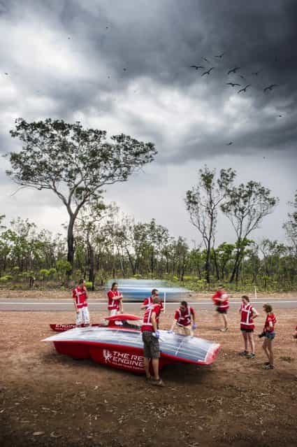 A handout image of the Red Engine Team obtained on 04 October 2013 shows Dutch Red Engine solar car team test drives their vehicle in the Northern Territory, Australia, 21 September 2013. The Dutch vehicle is competing in the World Solar Challenge, driving from Darwin to Adelaide starting on 06 October 2013. (Photo by Joost Van Baars/EPA/Red Engine Team)