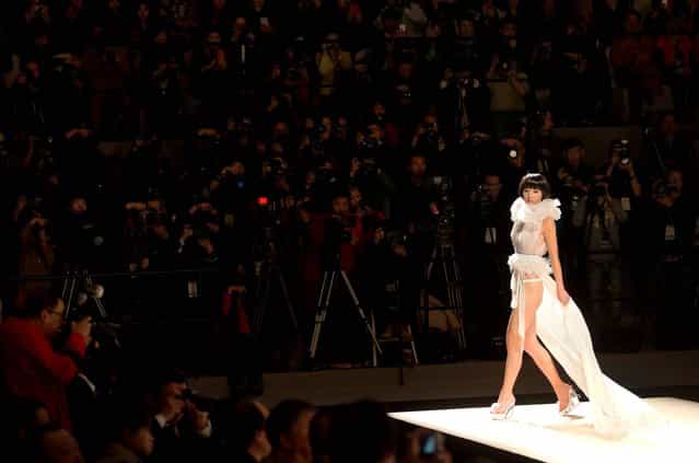 A model presents a creation from a lingerie collection during the China Fashion Week in Beijing Wednesday, October 30, 2013. (Photo by Andy Wong/AP Photo)
