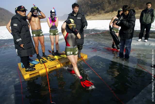 South Koreans Participate In Ice Diving Contest