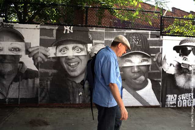 French Street Artist JR Installs Large Scale Portraits In The Bronx