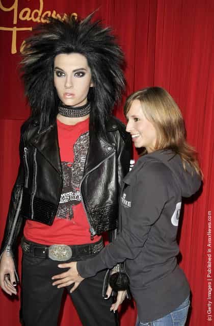 Tokio Hotel fan Jennifer sexy poses with Bill Kaulitz wax figure