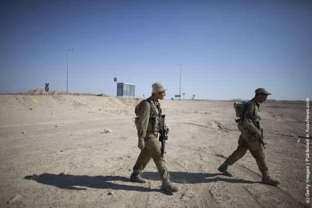 Soldiers set up a check point 60 km from Eilat, following series of coordinated gun and roadside bomb attacks against miltary and civilian targets near the Israeli - Egyptian border