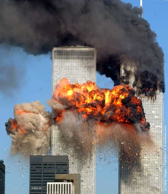 Hijacked United Airlines Flight 175 from Boston crashes into the south tower of the World Trade Center and explodes at 9:03 a.m. on September 11, 2001 in New York City