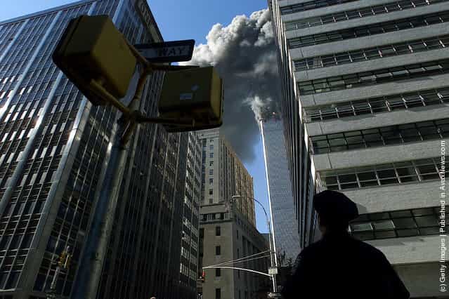 A view of the burning World Trade Center towers from Park Place Street and West Broadway Avenue during the deadly terrorist attack September 11, 2001