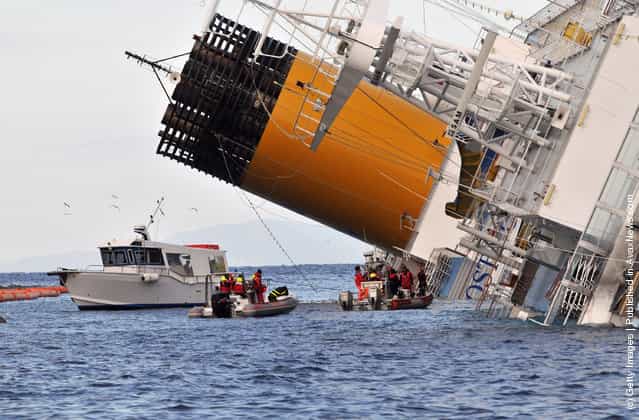 The cruise ship Costa Concordia lies stricken off the shore of the island of Giglio
