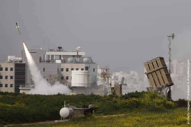 An Israeli missile is launched from the Iron Dome missile system in response to a rocket launch from the nearby Palestinian Gaza Strip, on March 12, 2012 near Ashdod