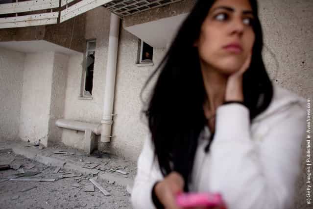 An Israeli woman reacts following a rocket attack from the nearby Gaza Strip