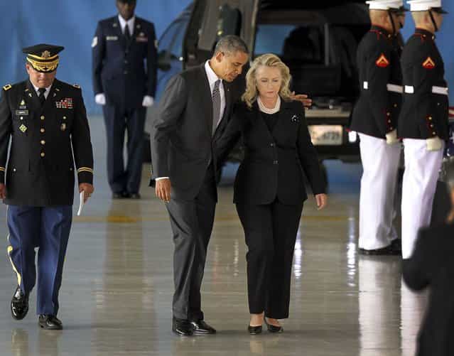 President Barack Obama and Secretary of State Hillary Clinton walk away from the podium during the Transfer of Remains Ceremony marking the return to the United States of the remains of the four Americans killed this week in Benghazi, Libya, at Joint Base Andrews. (Photo by Molly Riley/Polaris via Abaca Press/MCT)