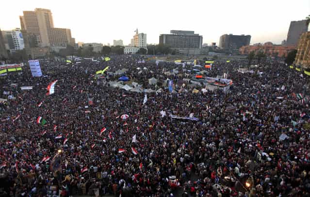 Thousands of Egyptian protesters gather in Tahrir Square, Cairo, on January 25, 2013. Two years after Egypt's revolution began, the country's schism was on display as the mainly liberal and secular opposition held rallies saying the goals of the pro-democracy uprising have not been met and denouncing Islamist President Mohammed Morsi. (Photo by Khalil Hamra/AP Photo/The Atlantic)