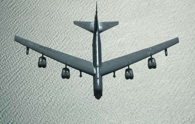 A U.S. Air Force B-52 bomber returns from a mission over Iraq, after refueling from a KC-10 plane over the Black Sea, on March 28, 2003. (Photo by Jockel Finck/AP Photo/The Atlantic)