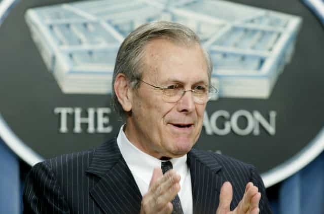 U.S. Defense Secretary Donald Rumsfeld speaks to the press at a Pentagon briefing in Washington, April 9, 2003. Rumsfeld praised the progress of American-led forces fighting in Iraq but warned the fighting would continue and the military still needed to account for Iraqi President Saddam Hussein. (Photo by Rick Wilking/Reuters/The Atlantic)