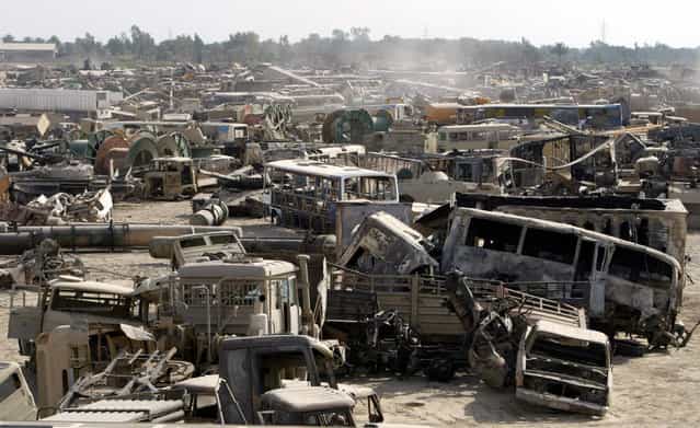 Wrecks of Iraqi military vehicles lie in a dump on the outskirts of Baghdad, on May 25, 2003. The vehicles brought here were destroyed when U.S.-led strikes used depleted uranium shells against tanks and other armored vehicles during the war that ousted Saddam Hussein. Iraqi doctors and scientists are worried that birth defects and childhood cancers could s

<div class=