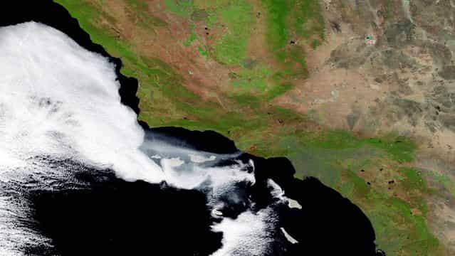 The wildfires in Ventura County are seen from space on Friday. (Photo by NOAA via Getty Images)