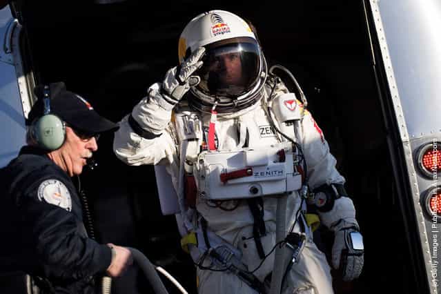Pilot Felix Baumgartner of Austria seen on his way to the capsule during the first manned test flight for Red Bull Stratos