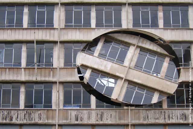 An installation by the artist Richard Wilson, entitled Turning the Place Over, is built into the condemned Cross Keys House in Moorfields as part of the Capital of Culture for 2008