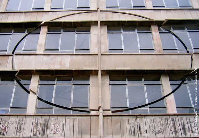 An installation by the artist Richard Wilson, entitled Turning the Place Over, is built into the condemned Cross Keys House in Moorfields as part of the Capital of Culture for 2008