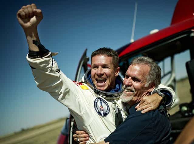 Baumgartner and Technical Project Director Art Thompson embrace after successfully completing the final manned flight for Red Bull Stratos in Roswell. (Photo by Joerg Mitter/Red Bull Stratos)