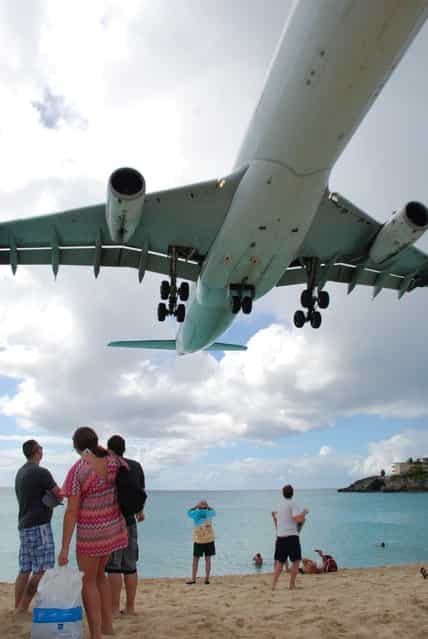 Spent the majority of the day at Maho Beach, right at the end of the runway for the Princess Juliana International Airport on the Sint Maarten side. Because the public beach and road are at the very end of the runway, you can experience the large (and small) airplanes landing and taking off. (Photo by Curtis & Renee)