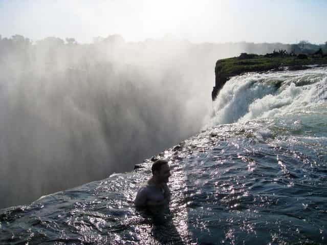 Me on the Edge of the Victoria Falls. (Photo by Jason Shallcross)