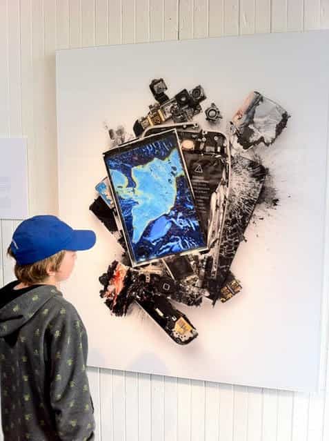 Artist Destroys Apple Products