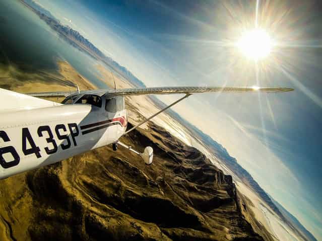 [Flying over Salt Lake by Tom Wallisch. Flying over Salt Lake and Stansbury Island today with @WileyMiller behind the wheel]. (Photo by Tom Wallisch)