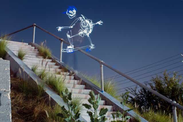 A light skateboarder grinding a rail. (Photo by Darren Pearson/Caters News)