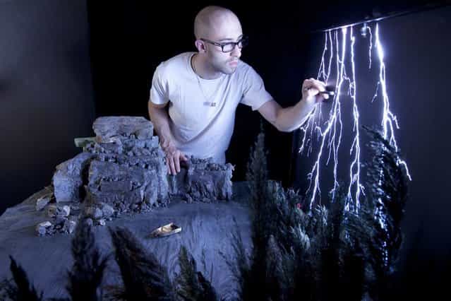 Matthew etches lightening bolts into plexiglass for his model, [Box of Lightening]. (Photo by Matthew Albanese/Barcroft Media)