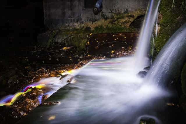 [Neon Luminance] glowstick waterfall photography, California, America. (Photo by Sean Lenz/Kristoffer Abildgaard)