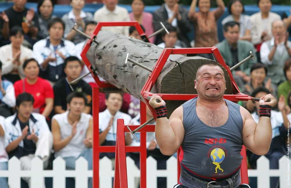 Elbrus Nigmatulin of Russia lifts a log during a match of the 2005 Worlds S...